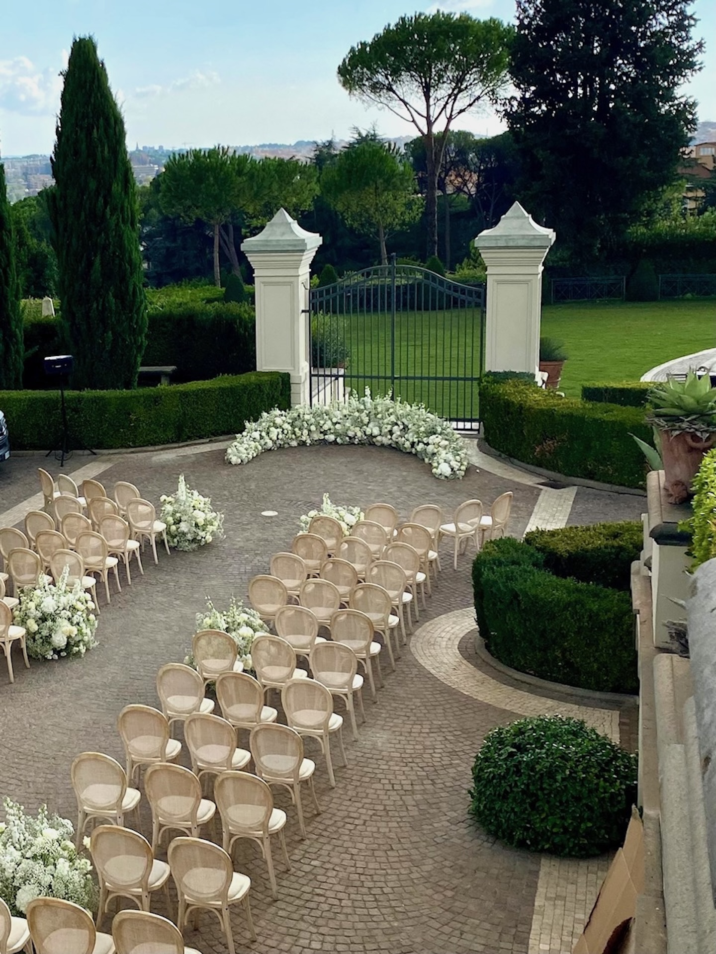 Ceremony at the gate of Villa Miani's Secret garden