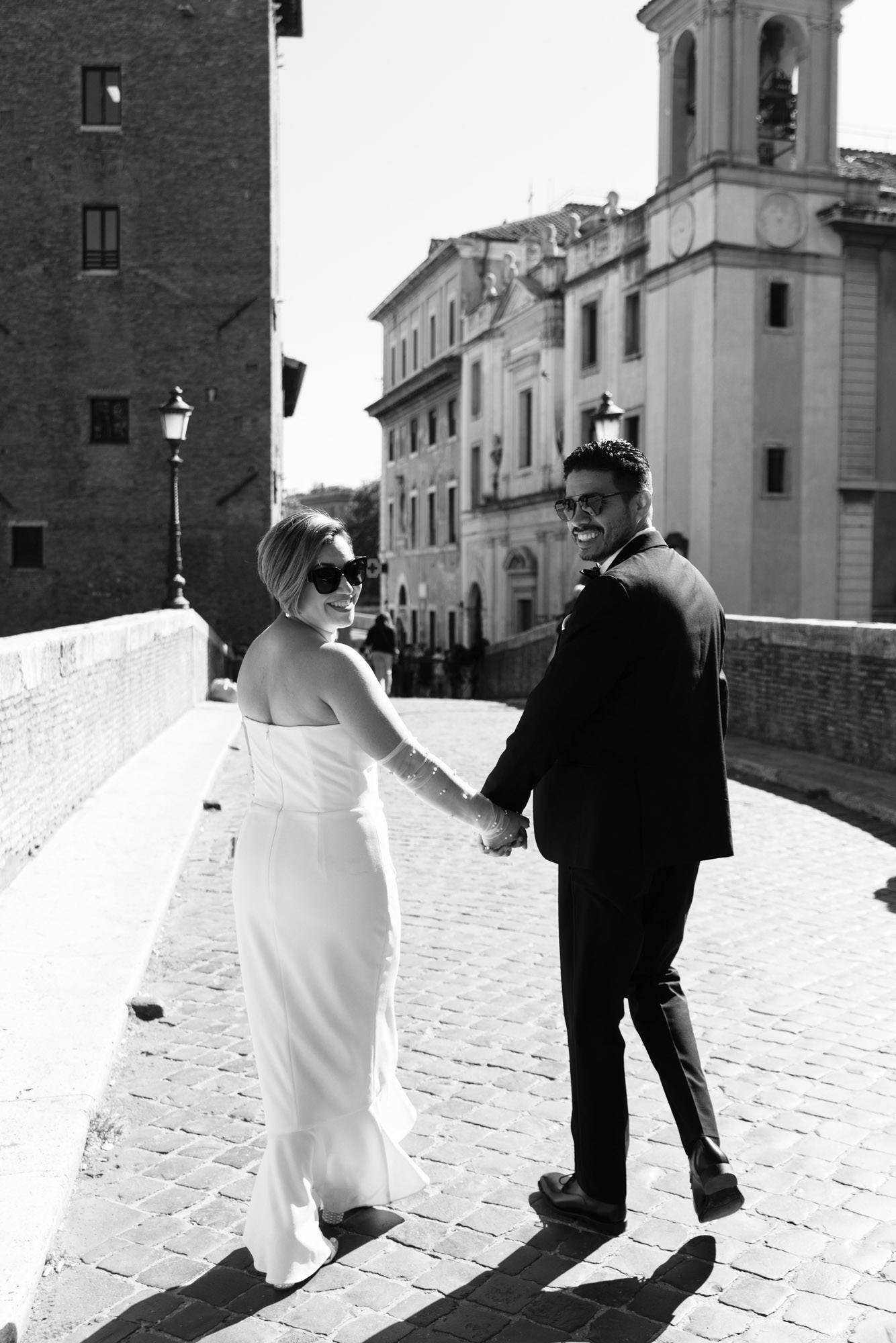 wedding couple walking around Rome