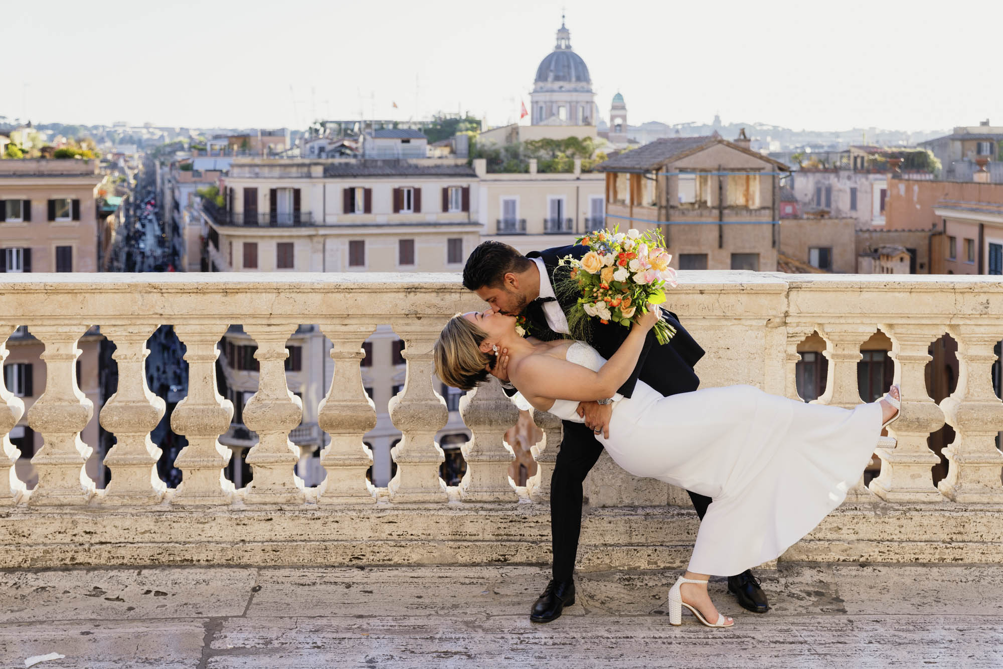 wedding couple kissing on Pincio terrace