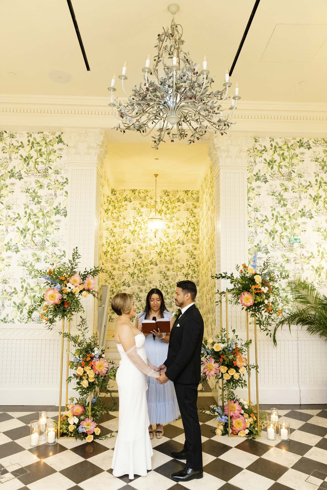 couple renewing vows at hotel de la ville